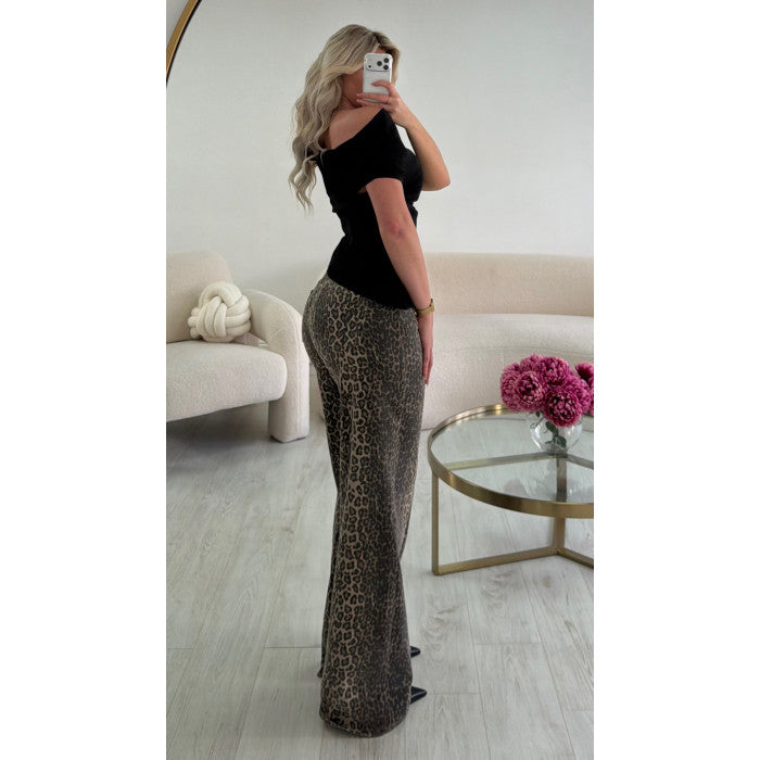 Top noir drapé asymétrique